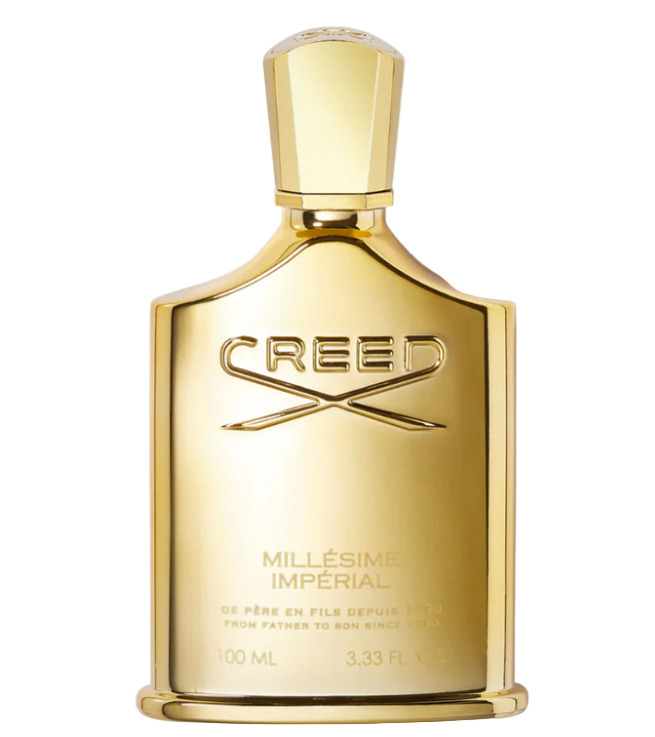 Gold Creed perfume bottle on a white background